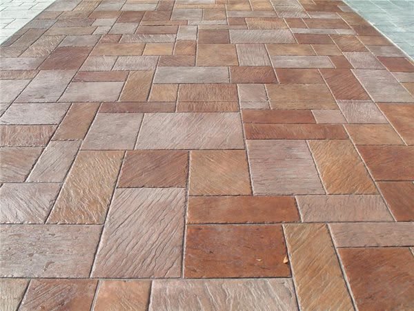 Stamped concrete patio with a patterned stone-like finish